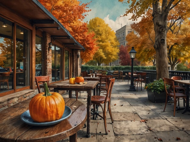 Auf dem Bild ist eine herbstliche Außenterrasse eines Cafés oder Restaurants zu sehen, dekoriert mit Kürbissen und umgeben von bunten, herbstlichen Bäumen. Hier sind einige praktische Tipps für deine Städtereise im Herbst:1. **Kleidung**: Trage Schichten! Das Wetter kann wechselhaft sein, mit warmen Tagen und kühlen Abenden.2. **Aktivitäten im Freien**: Nutze die bunten Herbstfarben für Spaziergänge in Parks oder botanischen Gärten. Das ist eine großartige Möglichkeit, die Natur zu genießen.3. **Kürbisfeste**: Informiere dich über lokale Kürbisfeste oder Ernteveranstaltungen, die oft im Herbst stattfinden.4. **Cafés und Restaurants**: Probiere gemütliche Cafés aus, die Herbst-Spezialitäten anbieten, wie Kürbiskuchen oder heiße Schokolade.5. **Fotomöglichkeiten**: Halte deine Kamera bereit für wunderschöne Herbstlandschaften und farbenfrohe Blätter.6. **Frühzeitig planen**: Viele Städte sind im Herbst beliebt für Kurzurlauber, also plane deine Unterkünfte und Aktivitäten im Voraus.Viel Spaß bei deiner Städtereise!