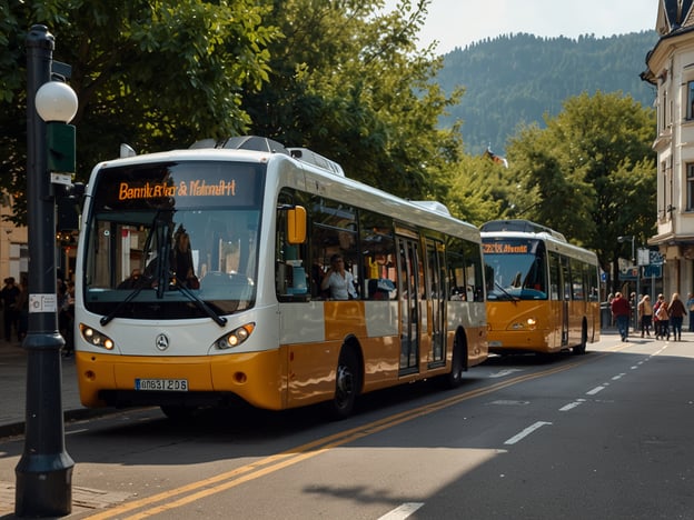 Auf dem Bild sind zwei moderne Busse zu sehen, die auf einer Straße fahren. Diese Art von öffentlichem Verkehr ist ideal, um sich in Städten fortzubewegen.### Anreise:Um mit dem Bus zu reisen, kannst du in der Regel an einer U-Bahn-Station oder einem zentralen Platz einsteigen. Achte auf die Buslinien und Haltestellen, die oft gut ausgeschildert sind.### Praktische Tipps für Deinen Besuch:1. **Fahrpläne prüfen:** Informiere dich im Voraus über die Fahrzeiten der Busse, um Wartezeiten zu minimieren.2. **Tickets kaufen:** Achte darauf, ein gültiges Ticket zu kaufen, bevor du in den Bus steigst. Dies kannst du oft an Automaten oder in Geschäften tun.3. **Routenplan:** Nutze eine App oder eine Website, um den besten Weg zu deiner Destination zu finden.4. **Sicherheit:** Halte dich an die Hinweise und Regeln im öffentlichen Verkehr, um sicher und angenehm zu reisen.5. **Sehenswürdigkeiten:** Nutze die busfähigen Routen, um interessante Plätze ohne großen Aufwand zu erreichen.Viel Spaß bei deinem Besuch!